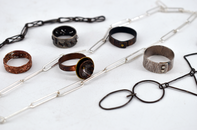 metal necklace and rings