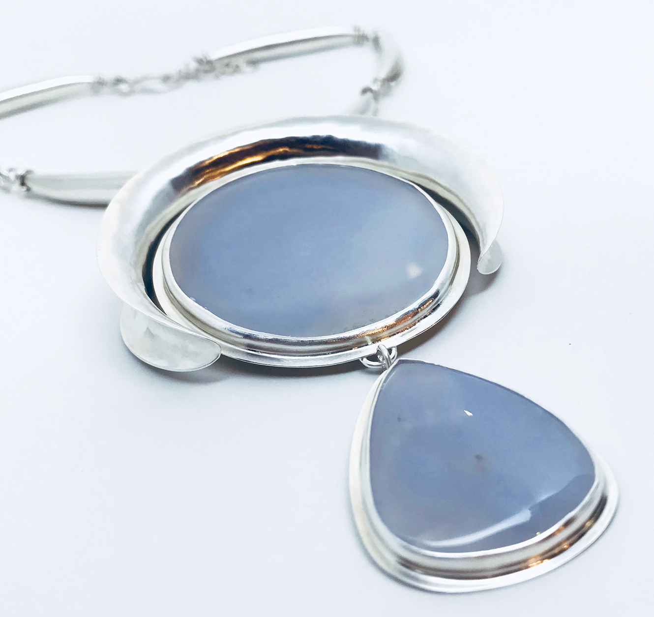 Blue and silver metal jewlery piece