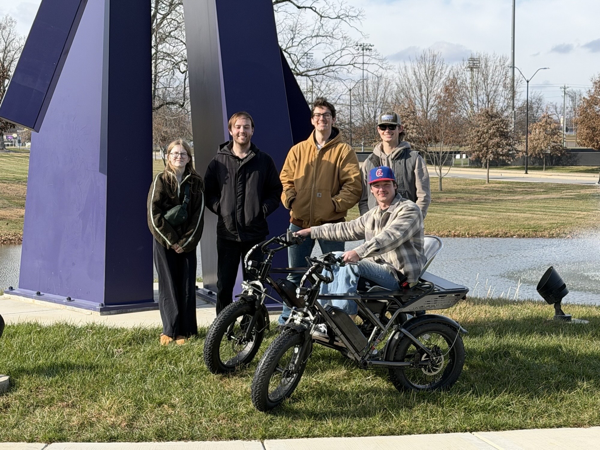 Nashville State Community College student Michael Vhan McGuire takes a ride in his new all-terrain wheelchair as the Tennessee Tech University engineering team that designed and built it looks on. From left, they are Christa Irby, Bradon Hopper, John Avery and Luke White; not pictured is Ashton Greenwood. Nashville State Community College student Michael Vhan McGuire takes a ride in his new all-terrain wheelchair as the Tennessee Tech University engineering team that designed and built it looks on. From left, they are Christa Irby, Bradon Hopper, John Avery and Luke White; not pictured is Ashton Greenwood.