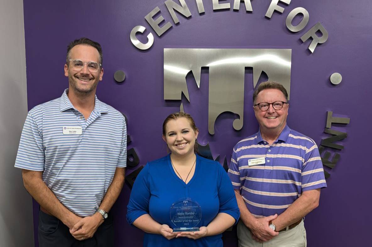 Holly Rambo being presented their award by Career staff