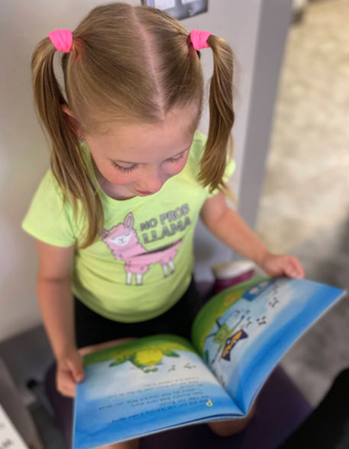 child reading a book