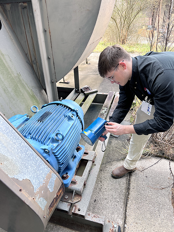 IAC student checking power source IAC student checking power source
