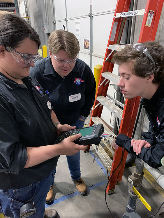 IAC students checking testing results IAC students checking testing results