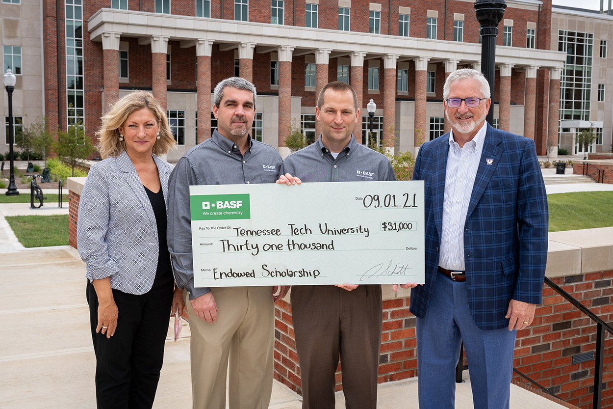 BASF presenting check to Lori Bruce and Phil Oldham