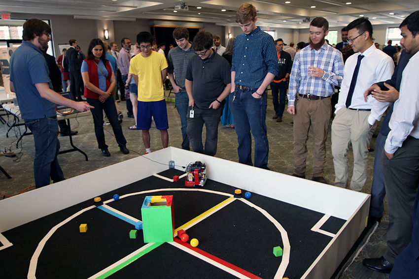 Students with robot project