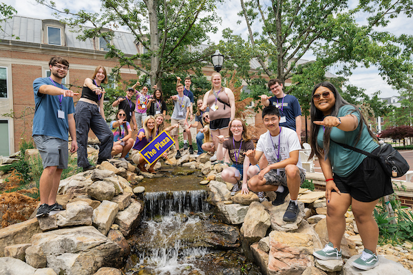 Incoming Tech students pose at Fearless Falls on Tech's Centennial Plaza during a SOAR session this summer.