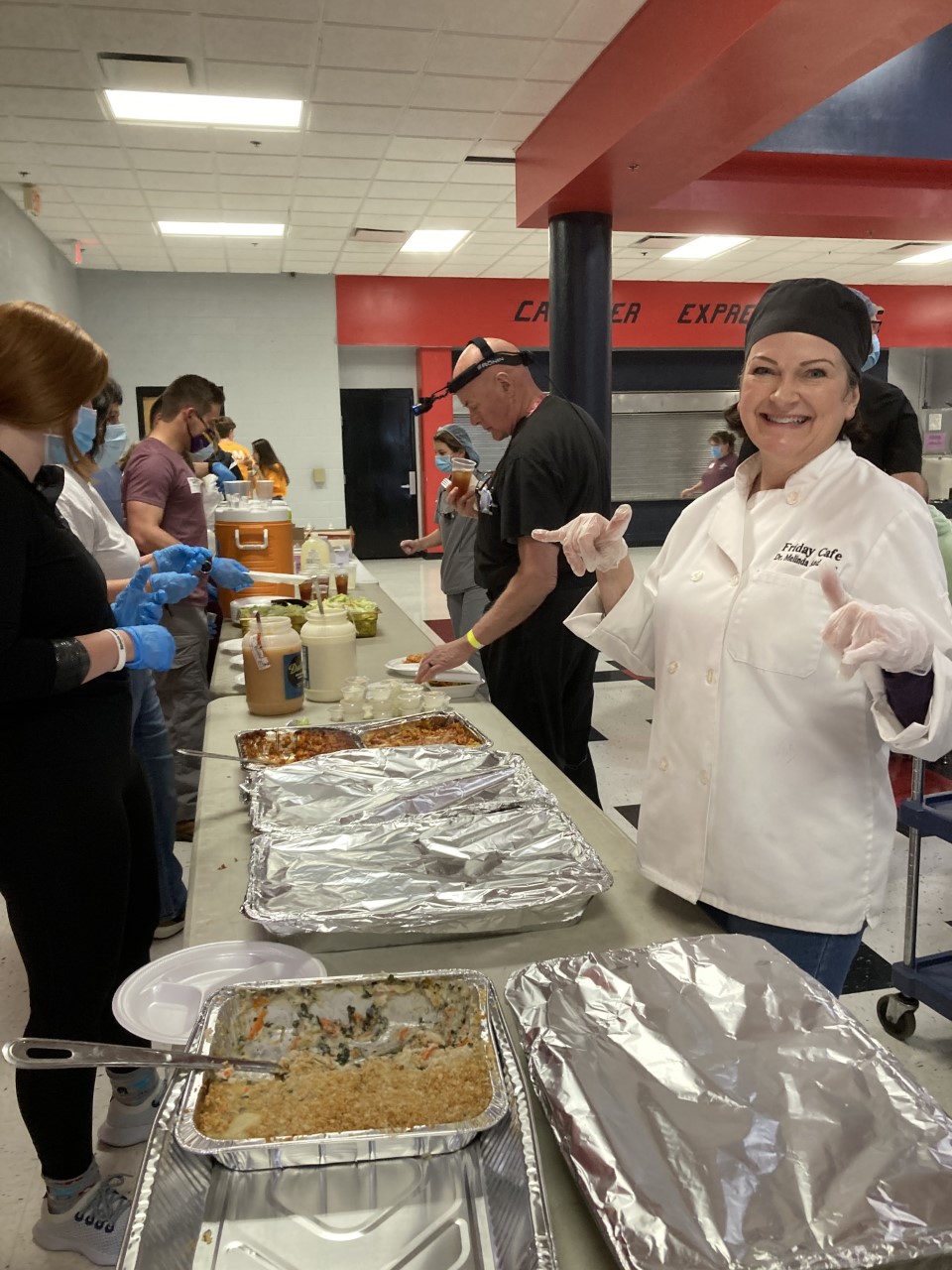 Dr. Melinda Anderson with her Food & Nutrition students and other TN Tech students, serve volunteer meals at last year's clinic.