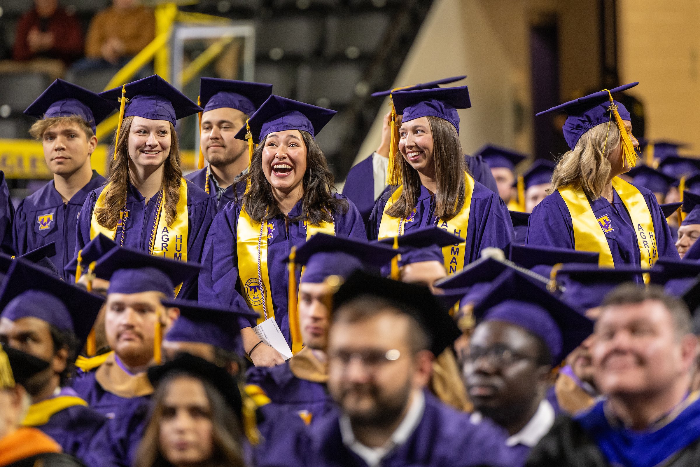 Graduates celebrate during the morning commencement ceremony.