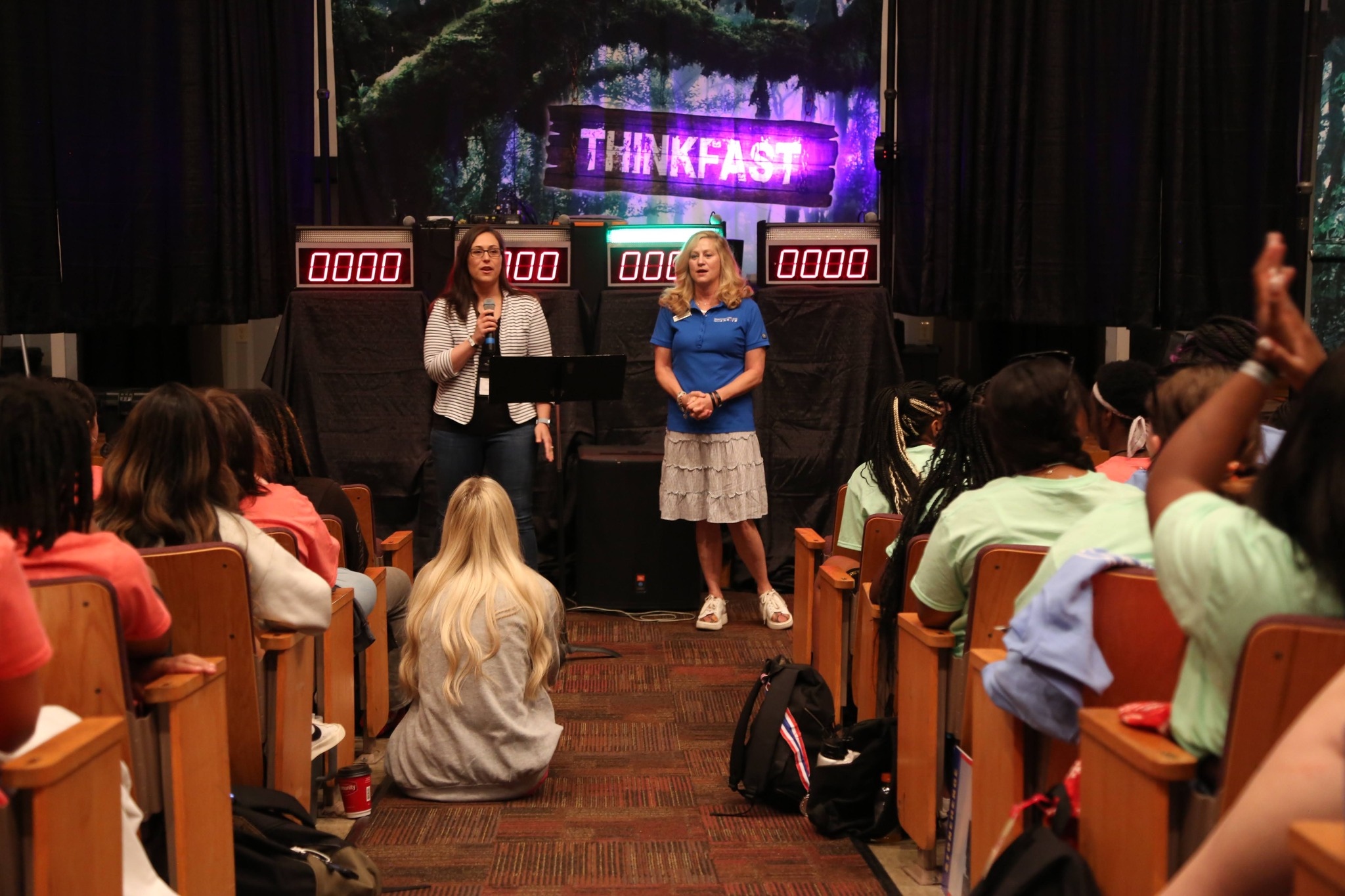 From left: Stephanie Scarborough, program manager for iCube, and Beth Vernon, program manager or the Tennessee Highway Safety Office, speak on behalf of Reduce TN Crashes at a Tennessee Teen Institute event. 