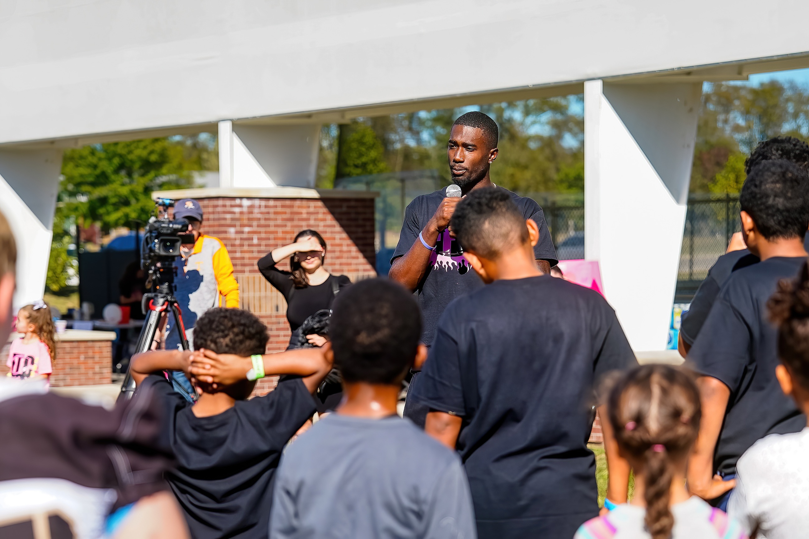 Tennessee Tech junior Jameson Wharton speaks to the crowd at the 2024 Football for the Cure, an annual event he started 11 years ago to raise money for cancer research. Photo by Christina Moore. 