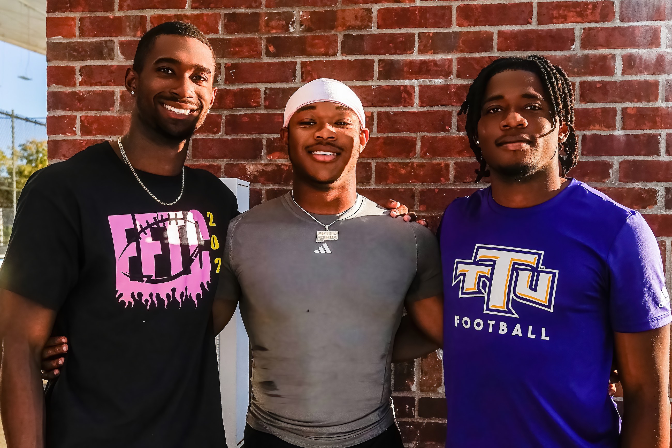 From left: Tennessee Tech Golden Eagle football defensive backs Jameson Wharton, Timothy Jones and Bertin Placide at this year’s Football for the Cure event. Photo by Christina Moore. 