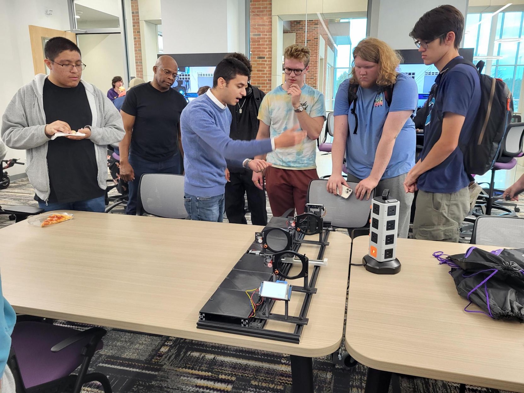 Students take in a demonstration at Quantum Discovery Day.